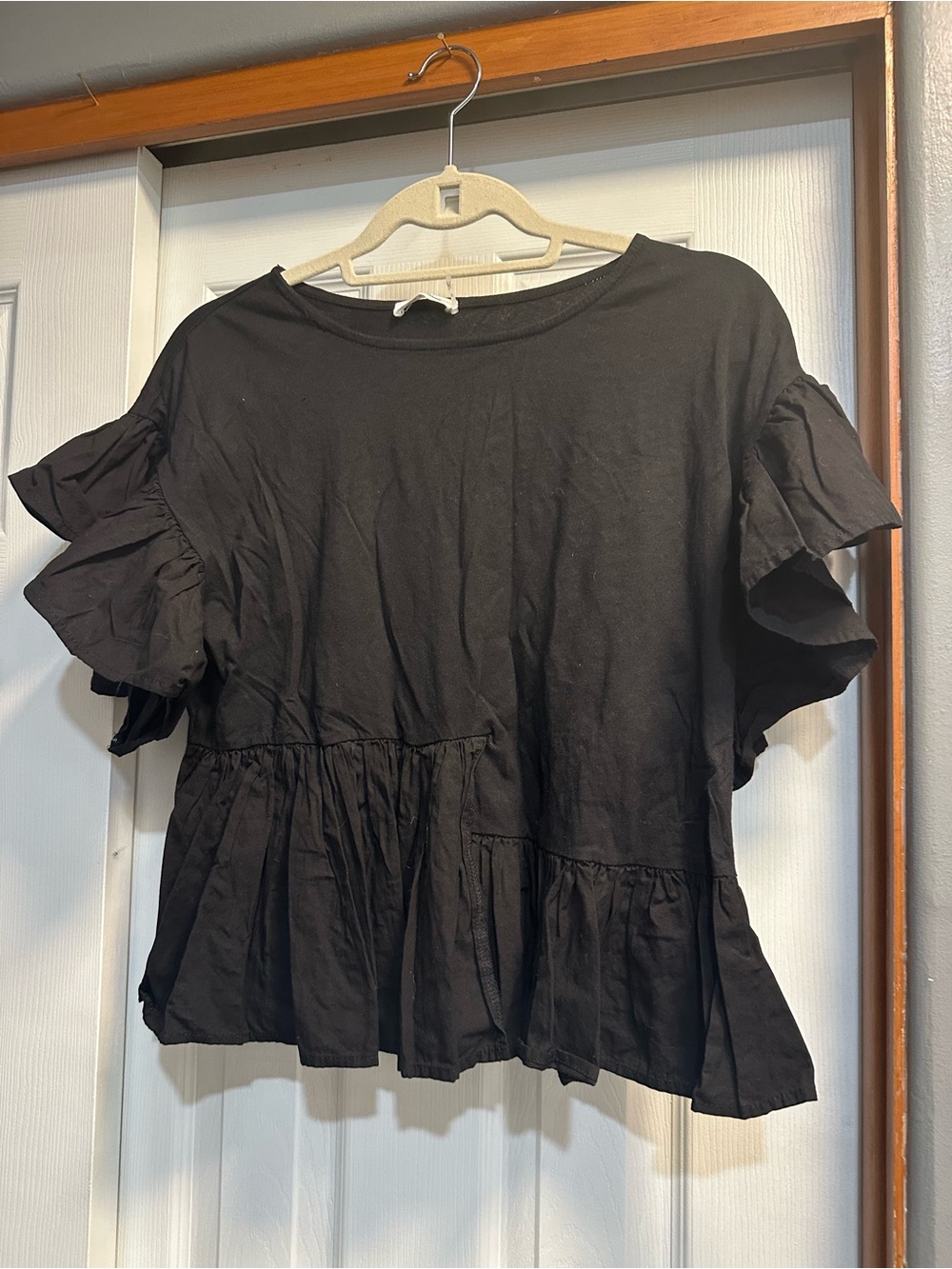 Black Ruffle-Sleeve Peplum Top - Women